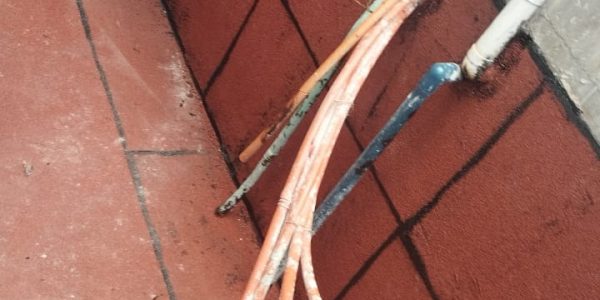 Aplicación Impermeabilizante carpeta asfáltica en dique de departamentos